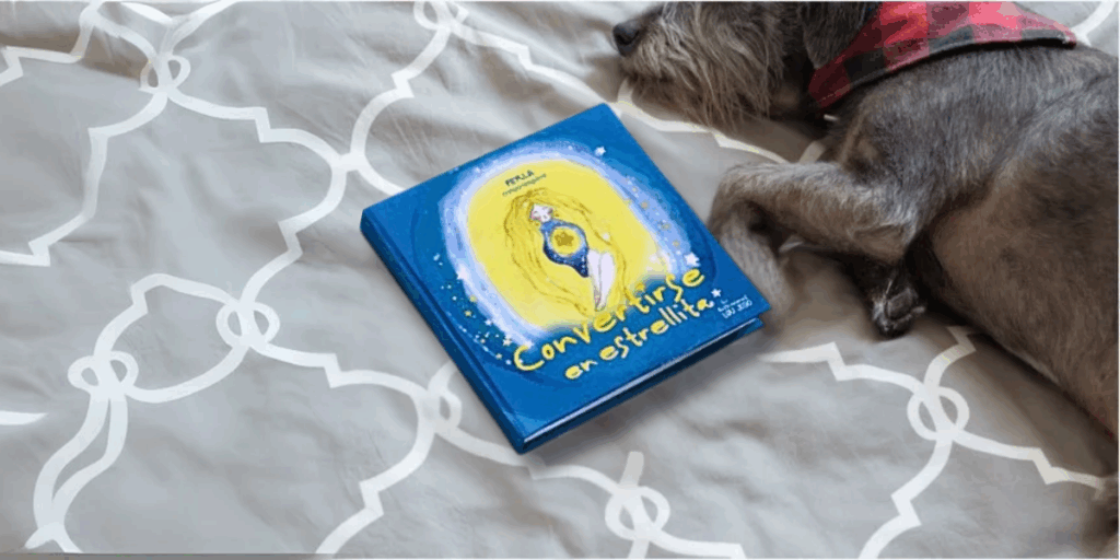 Libro Convertirse en Estrellita acompañado por un perrito